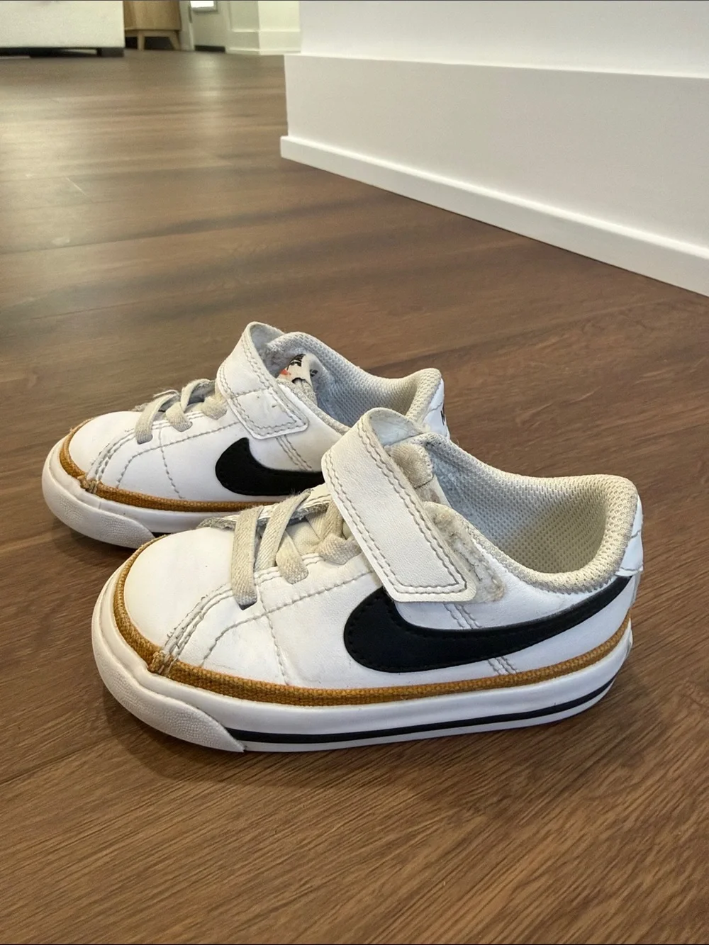 Nike Kids White and Tan Low-Top Sneakers with Black Swoosh